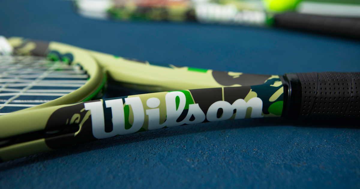 A BATHING APE - 定価以下新品！ BAPE×WILSONテニスラケット緑カモ A BATHING APE® × WILSON®のアイコニックなカプセルコレクション