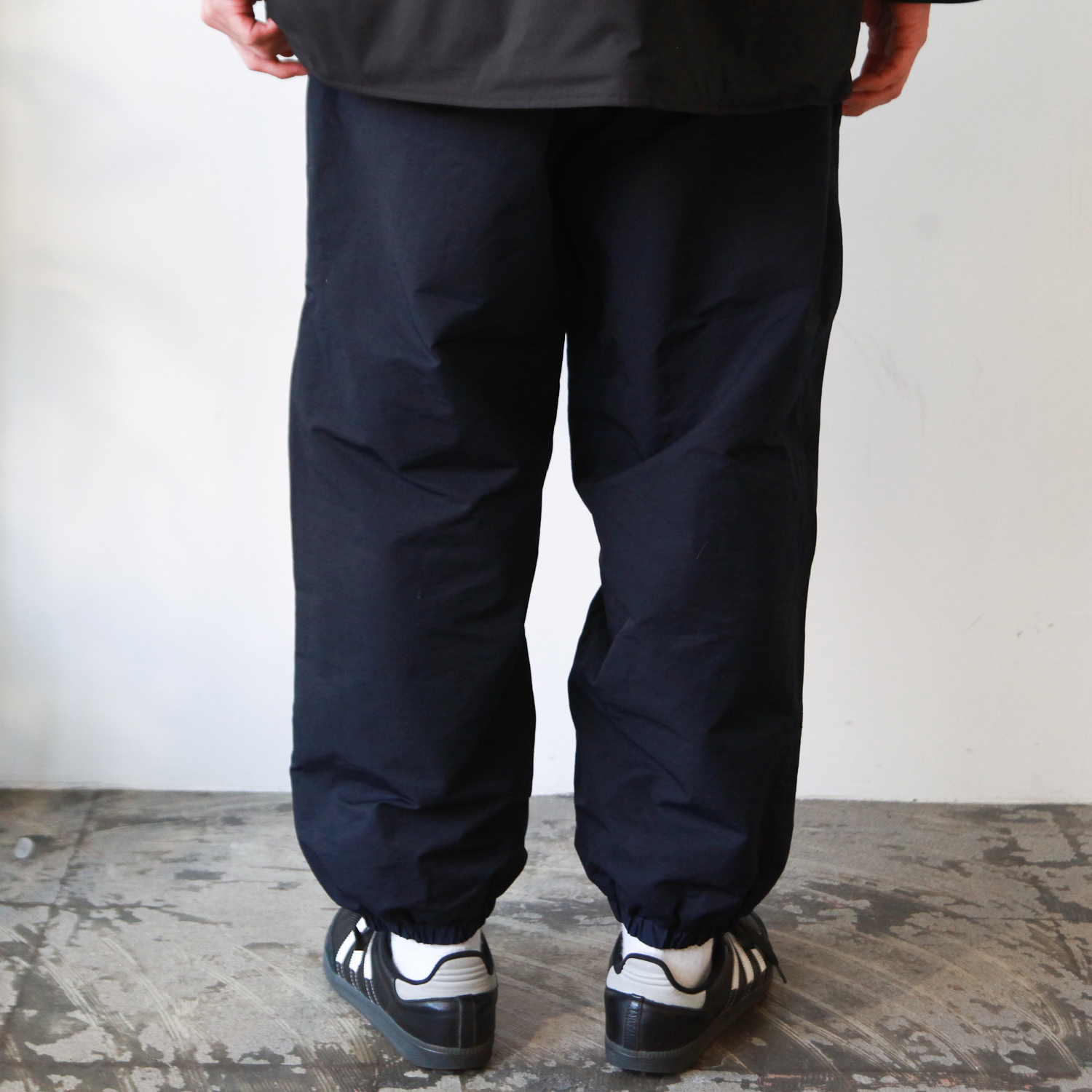 紺×赤 Private brand by s.f.s nylon track pants - crumiller.com