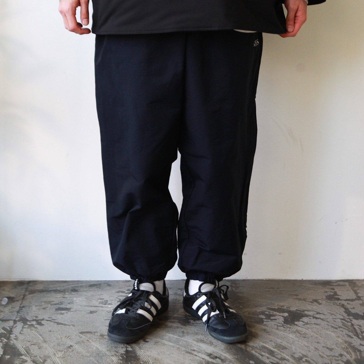 ナイロントラックパンツPrivate brand by S.F.S Track Pants ネイビー ...